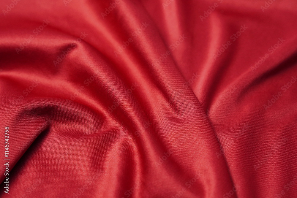 Fototapeta premium red cloth with ripples and waves texture background