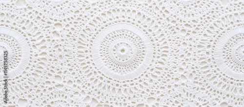 White organic cotton crochet lace seamless background ideal for scrapbook projects cushion covers and decorative tablecloth designs