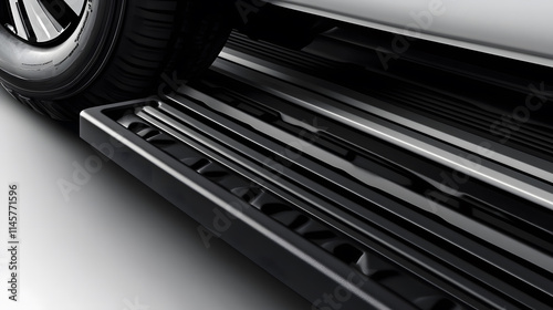 A close-up view of a vehicle's running board and tire, showcasing sleek design and texture for improved accessibility and style