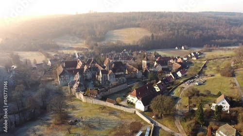 Aerial drone shot of the historic medieval village and monastery of Bebenhausen at sunrise