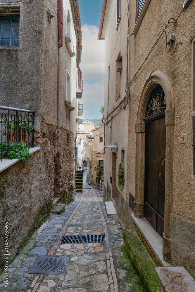 A small street in Corleto Monforte, an old town in the province of Salerno, Italy. A small street in Corleto Monforte, an old town in the province of Salerno, Italy.