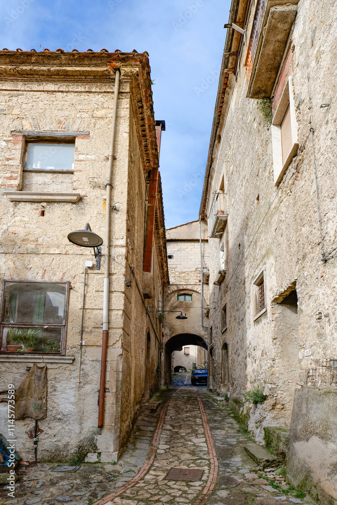 Fototapeta premium A small street in Corleto Monforte, an old town in the province of Salerno, Italy.