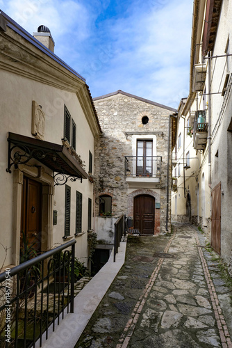 Fototapeta Naklejka Na Ścianę i Meble -  A small street in Corleto Monforte, an old town in the province of Salerno, Italy.