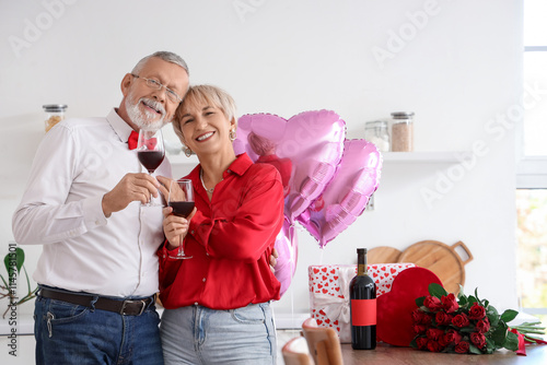 Happy mature couple with gl...