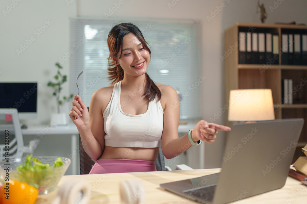 Young Asian woman live chatting, video calling on laptop computer, how to lose weight with diet. Introducing useful fruits and vegetables Lifestyle Influencer Healthy concept, lifestyle. Young Asian woman live chatting, video calling on laptop computer, how to lose weight with diet. Introducing useful fruits and vegetables Lifestyle Influencer Healthy concept, lifestyle.