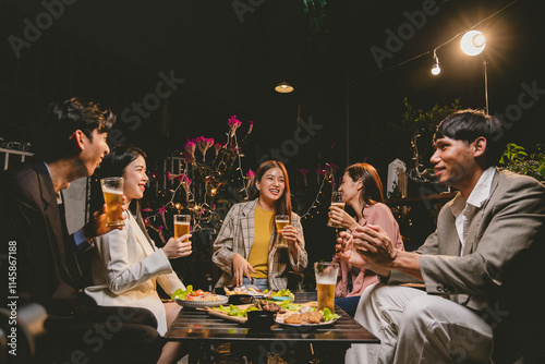 A lively group of friends enjoying beers at a festive pub, toasting with frosty pints. The scene captures the joy of friendship, culture, and celebration over drinks and appetizers on a sunny terrace. photo