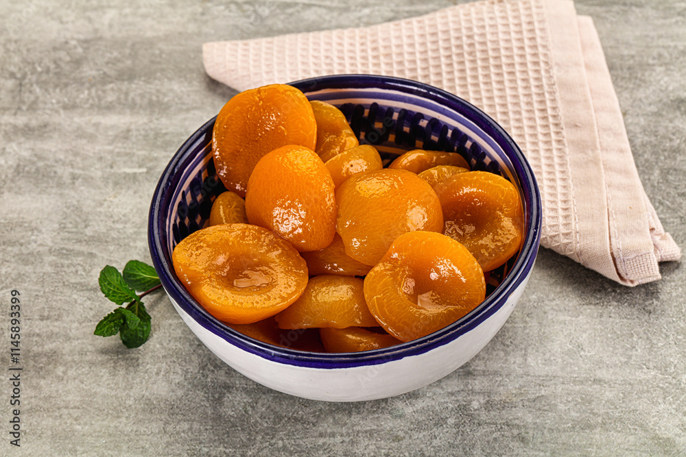 Sweet canned apricots with syrope Sweet canned apricots with syrope