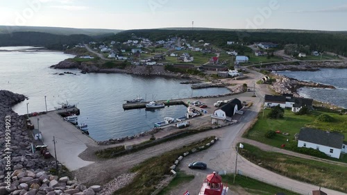 Drone shot of Neils Harbour and countryside at Cape Breton, Nova Scotia photo