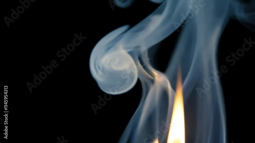 Close-Up of a Single Candle Flame Illuminating Darkness with Gentle Glow and Surrounding Soft Shadows Creating a Tranquil Atmosphere