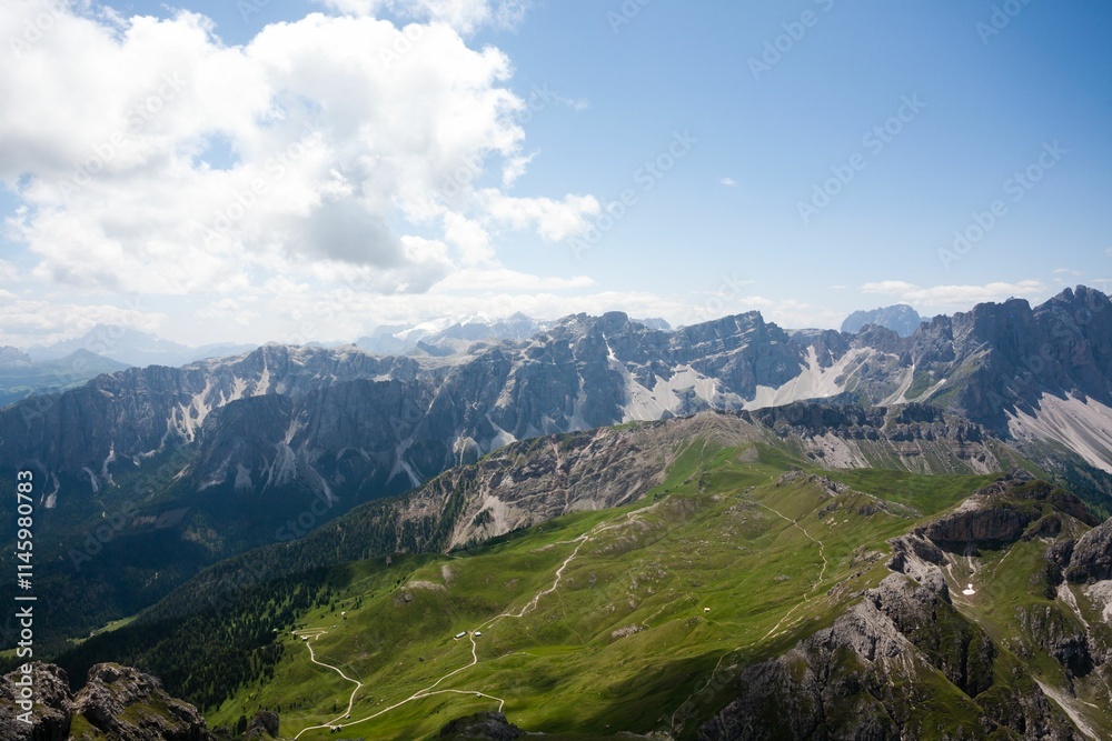 Breathtaking Dolomites view with lush valleys. Breathtaking Dolomites view with lush valleys.