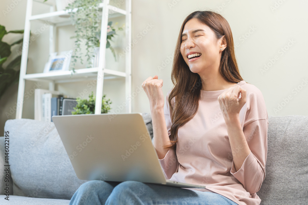 Happy cheerful asian young woman celebrating lottery win or achievement, looking at laptop computer screen, received good news, enjoy with offer discount for shopping online, making surprise gesture Happy cheerful asian young woman celebrating lottery win or achievement, looking at laptop computer screen, received good news, enjoy with offer discount for shopping online, making surprise gesture