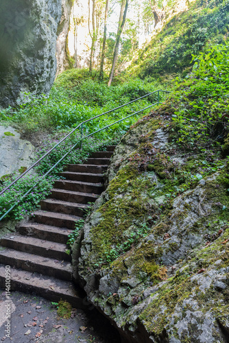 Trail with steps and railings to Silicka ladnica in Slovensky kras national park in Slovakia photo