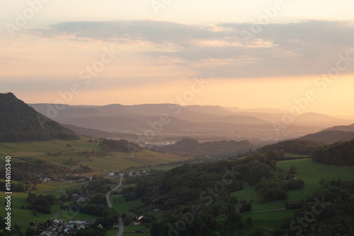 Albtrauf und das Albvorland zum Sonnenuntergang im Sommer, Aussicht von der Ostalb bei Nenningen. photo