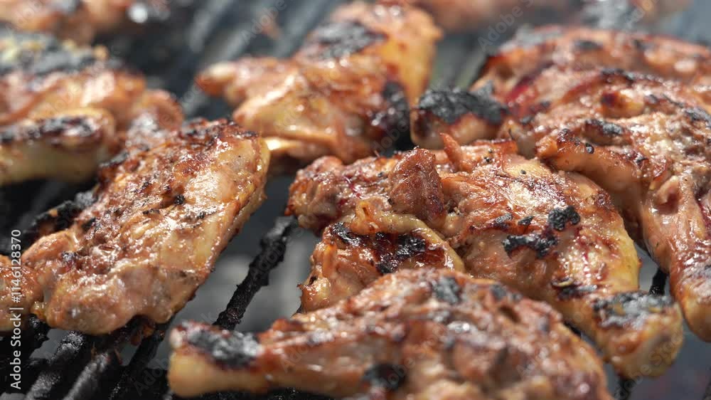 Home barbecue grilling of chicken drumstick on charcoal grill, Mahe, Seychelles 30fps 3. Home barbecue grilling of chicken drumstick on charcoal grill, Mahe, Seychelles 30fps 3.