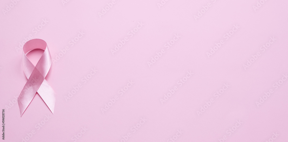 Pink ribbon on color background, top view. Cancer awareness Photo Formats Pink ribbon on color background, top view. Cancer awareness Photo Formats