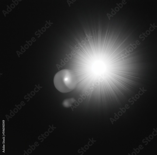 White lens flare effect on a dark background photo