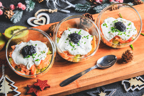 Kiwi salmon cream cheese and lumpfish roe verrine in studio photo