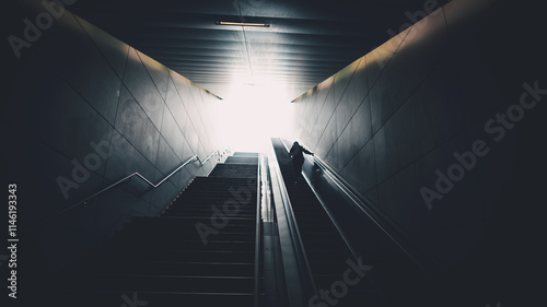 silhouette on escalator