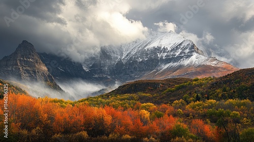 Autumn rainstorm over mount timpanogas with clouds briefly breaking to illuminate vibrant fall colors and dramatic sky photo