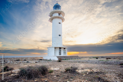 Wallpaper Mural Formentera, baleares, faro Cap de Barbaria, cabo de Barbaria al atardecer  con el cielo rojo Torontodigital.ca