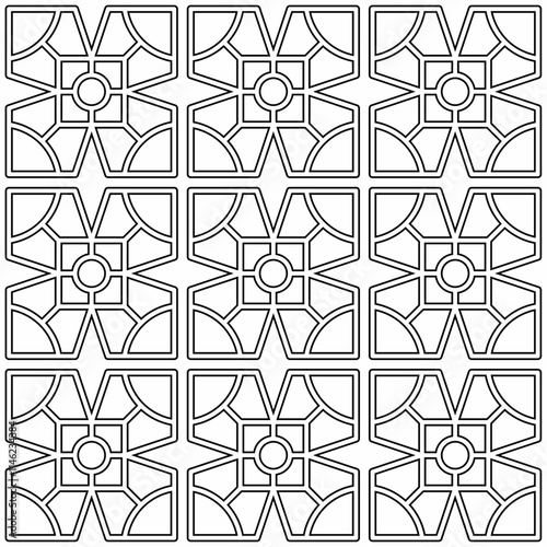 Seamless black and white geometric pattern consisting of symmetrical shapes in a grid layout. Suitable for backgrounds, textiles and various creative projects.