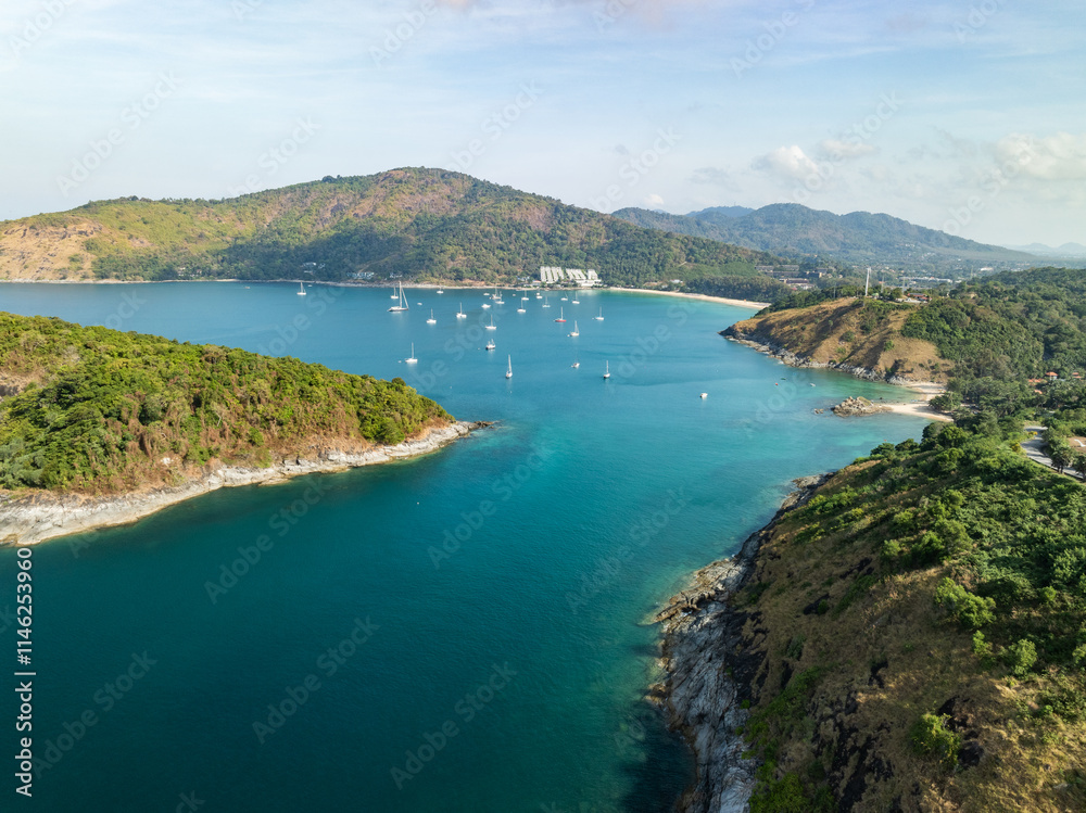 Bird eye view seashore with wave crashing on rock cliff, Beautiful sea surface in sunny day summer background, Amazing seacoast landscape view Bird eye view seashore with wave crashing on rock cliff, Beautiful sea surface in sunny day summer background, Amazing seacoast landscape view
