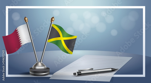 Qatar and Jamaica National flags on small table with bokeh background, cooperative relationship