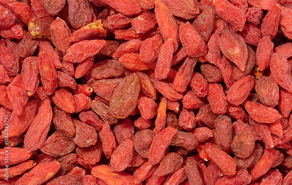 Pile of dry red goji berries on isolated background, close up Pile of dry red goji berries on isolated background, close up