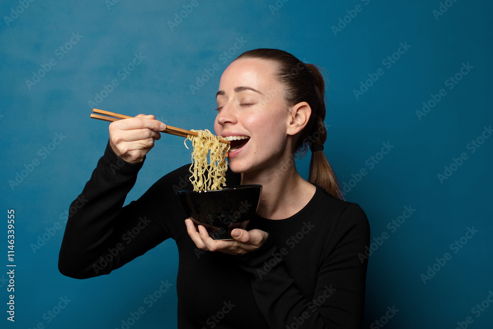 blonde young pretty chef woman with a ramen bowl blonde young pretty chef woman with a ramen bowl