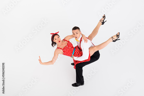Εκτύπωση καμβά Photo of funny couple professional dancers choreographers dancing cha cha isolat