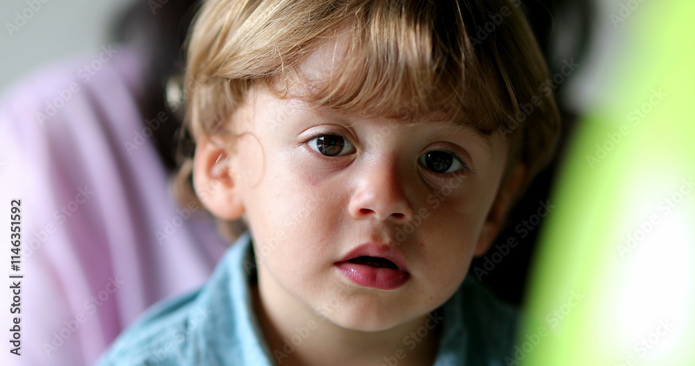 Cute baby toddler portrait talking at camera. Handsome child