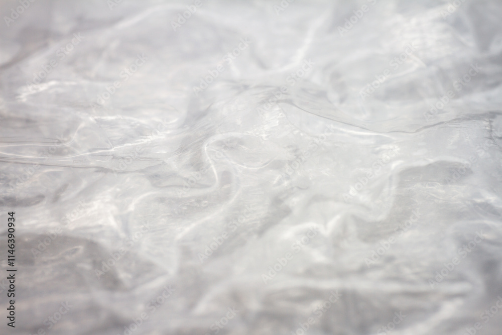 Fototapeta premium Extreme macro of plastic bubble wrap texture. Selective soft focus, shallow depth of field. Abstract dreamy background
