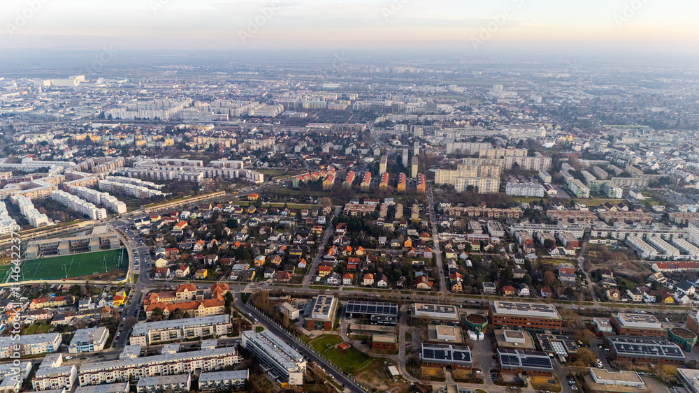 Austria, Vienna: Top Aerial View of Quiet Residential Areas in Districts 21 and 22. A peaceful perspective showcasing the serene neighborhoods of the Austrian capital Austria, Vienna: Top Aerial View of Quiet Residential Areas in Districts 21 and 22. A peaceful perspective showcasing the serene neighborhoods of the Austrian capital