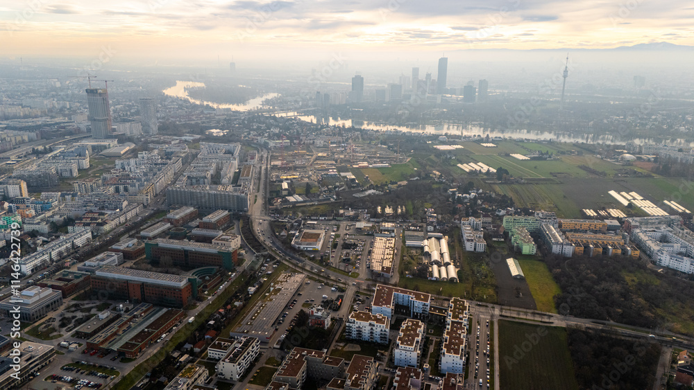 Austria, Vienna: Top Aerial View of Quiet Residential Areas in Districts 21 and 22. A peaceful perspective showcasing the serene neighborhoods of the Austrian capital