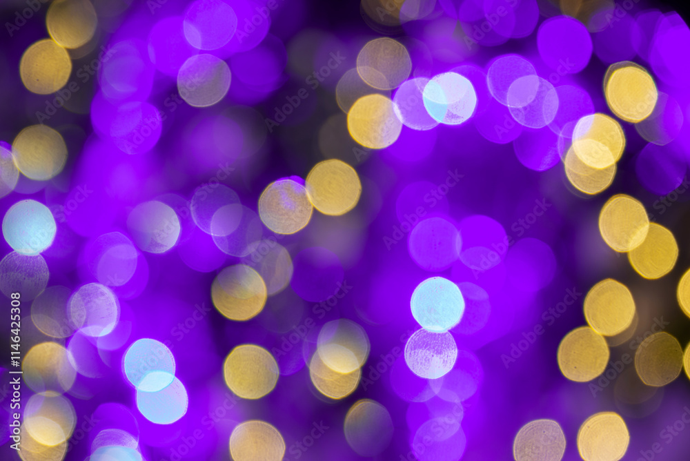 Purple and gold bokeh holidays lights at night, Mardi Gras carnival christmas or new year party background