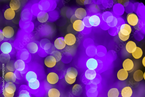 Obraz na płótnie Purple and gold bokeh holidays lights at night, Mardi Gras carnival christmas or new year party background w salonie