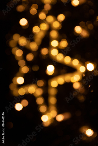 Golden Bokeh Abstract With Warm Lights and Black Background