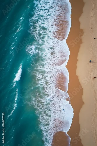 Overhead video of crashing waves on the sand, beach, Aerial view