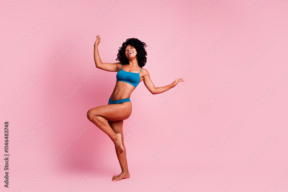 Full body photo of cheerful lady moving raise hands feet wear blue lingerie isolated pastel color background Full body photo of cheerful lady moving raise hands feet wear blue lingerie isolated pastel color background