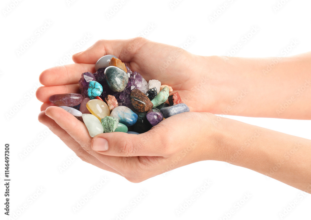 Woman holding different natural mineral stones on white background, closeup Woman holding different natural mineral stones on white background, closeup