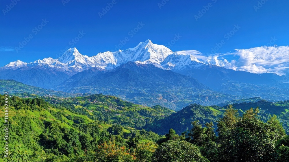 Obraz premium Majestic mountain landscape with lush greenery and bright blue skies.