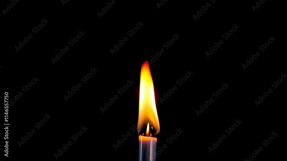 A candle burns steadily, with its flame flickering gently. The glow of the fire creates a tranquil ambiance in the dark surroundings, inviting relaxation. A candle burns steadily, with its flame flickering gently. The glow of the fire creates a tranquil ambiance in the dark surroundings, inviting relaxation.