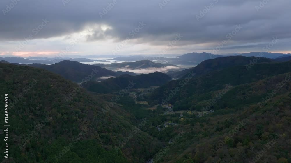 Distant foggy mountain landscape of Fukuchiyama in Rural Kyoto, Japan Distant foggy mountain landscape of Fukuchiyama in Rural Kyoto, Japan