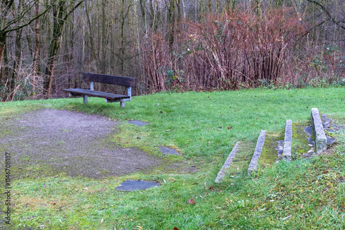 Empty bench and stone steps inviting visitors to relax in peaceful park