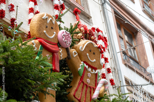 Gingerbread Christmas decoration on a tree with lights in Strasbourg France