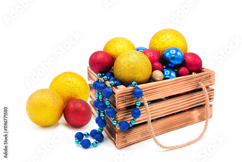 Wooden vintage box with shiny Christmas tree decorations, balls and garlands isolated on a white background. Winter holidays. New Year.	 photo