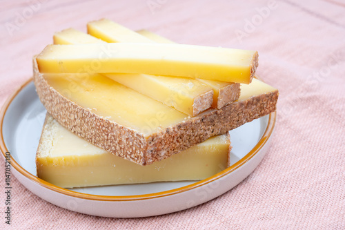 French yellow cheese Comte, varieties unpasteurised cow milk Prestige, fruity flavoured Fruite and Vieille Reserve close up