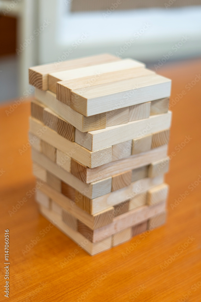 Wooden block tower game on a table Wooden block tower game on a table