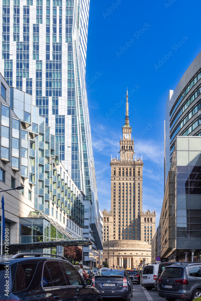 Obraz premium WARSAW, POLAND - June 18, 2024: The streets are the Orco Tower skyscraper, the Palace of Culture and Science, Golden Terraces on Zlota Street.