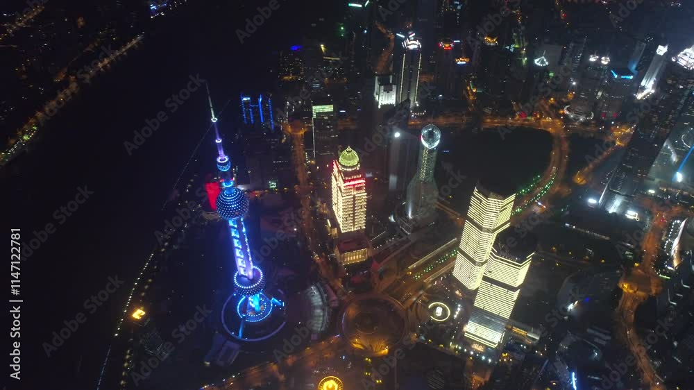 SHANGHAI, CHINA - NOVEMBER 7, 2024: Aerial view showcasing the vibrant skyline of Shanghai illuminated at night SHANGHAI, CHINA - NOVEMBER 7, 2024: Aerial view showcasing the vibrant skyline of Shanghai illuminated at night